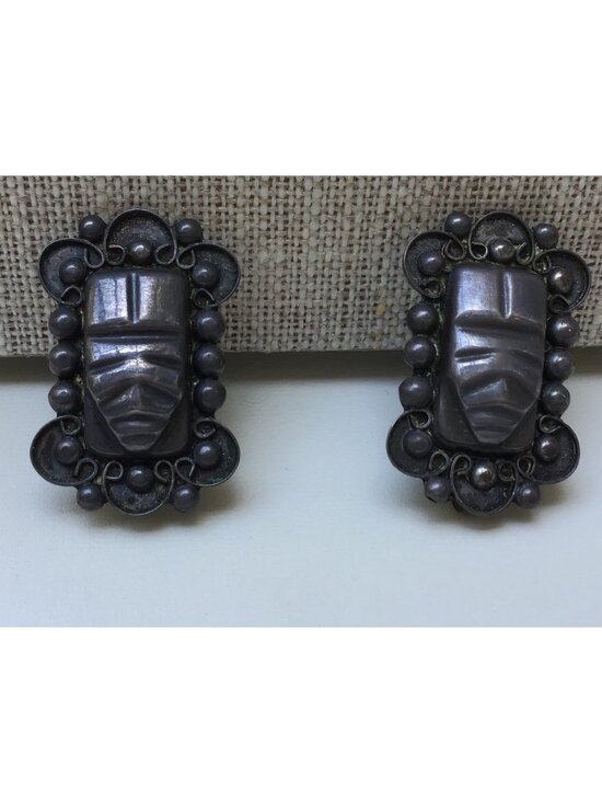 Hecho en Mexico Jewelry - Vintage Mexican Sterling Silver Clip-On Earrings With Carved Tribal Mask Design